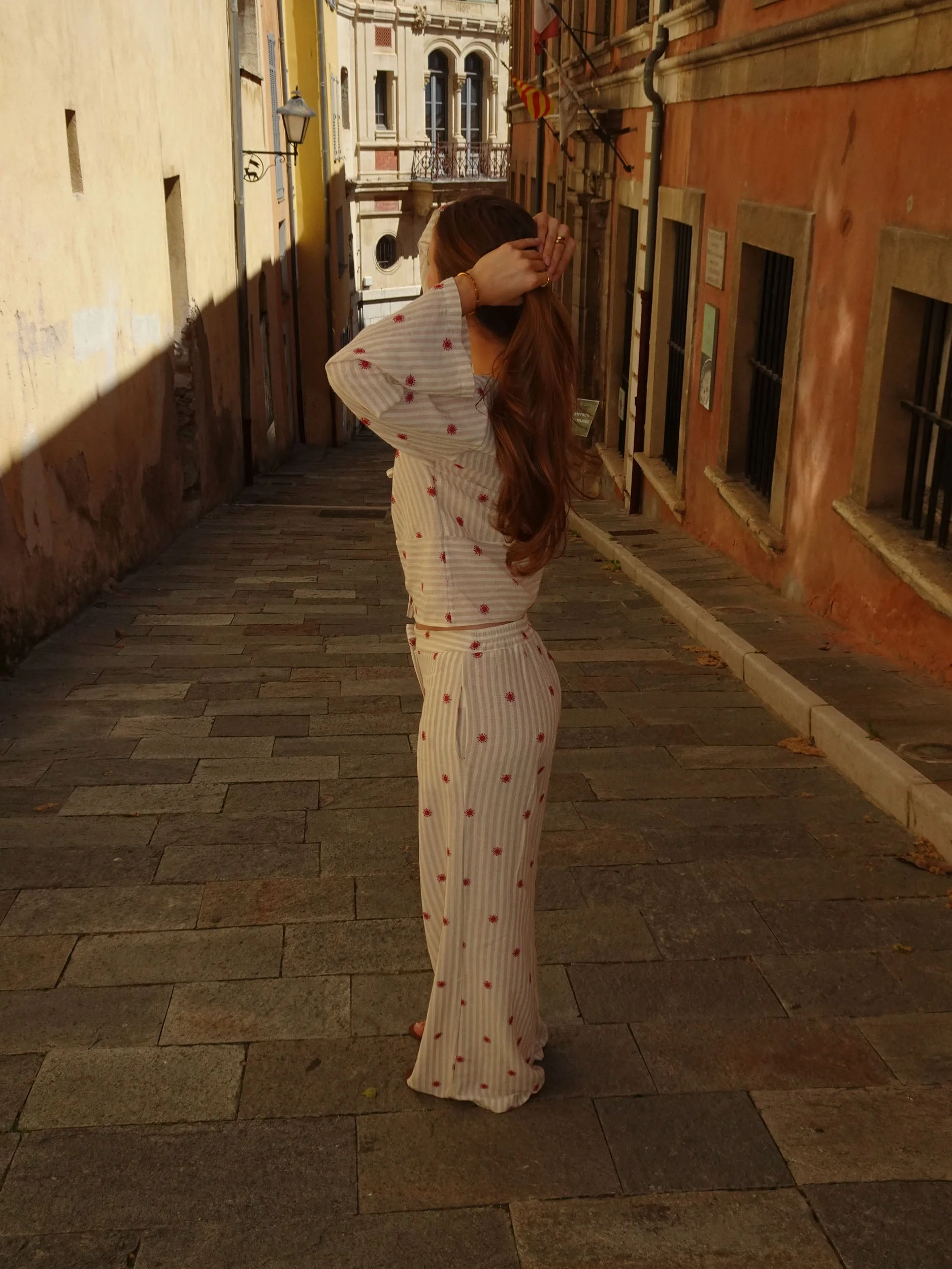 Mireille trousers with sun pattern – Beige/red 10 Mireille trousers with sun pattern – Beige/red