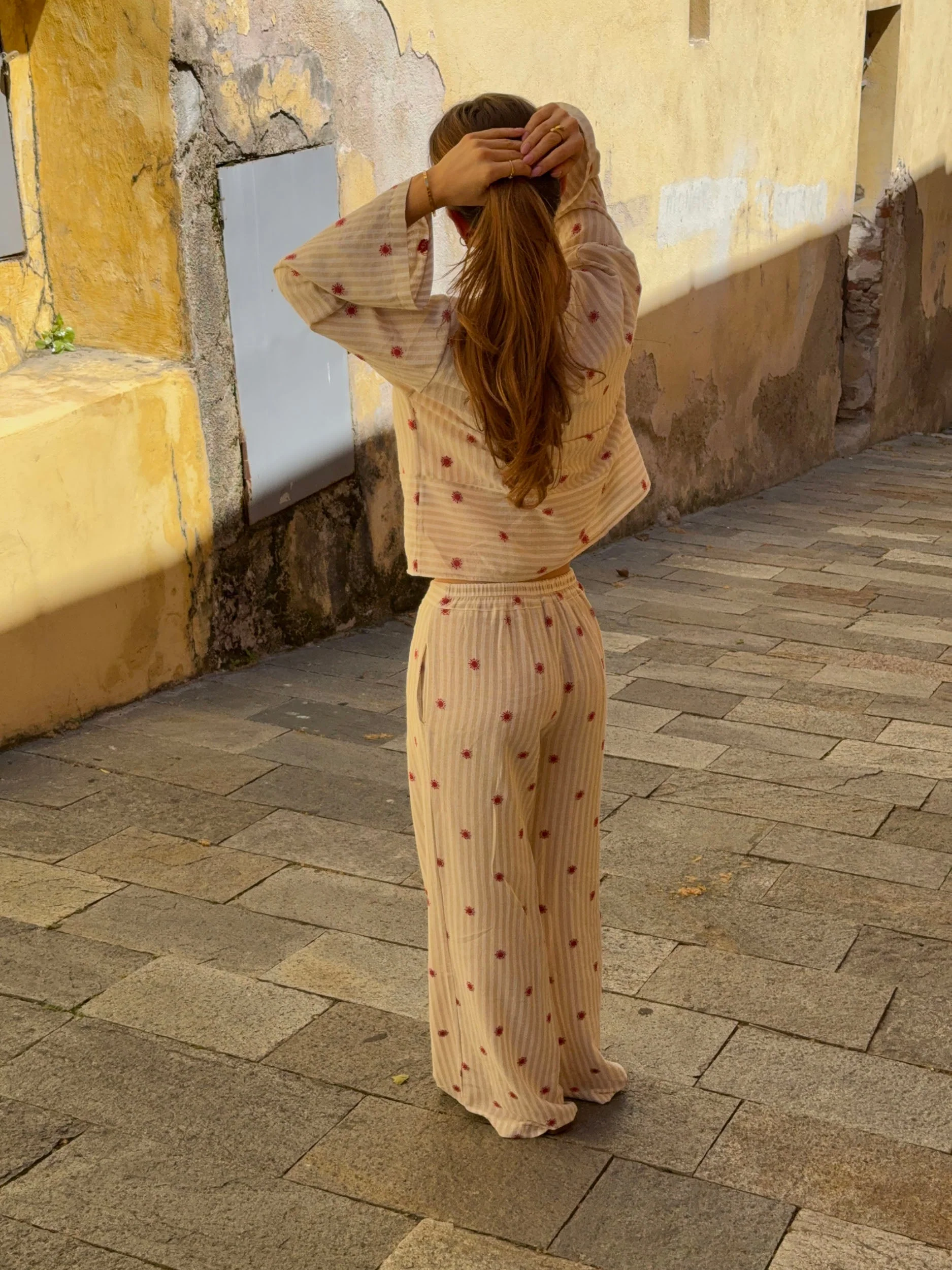 Mireille trousers with sun pattern – Beige/red 2 Mireille trousers with sun pattern – Beige/red
